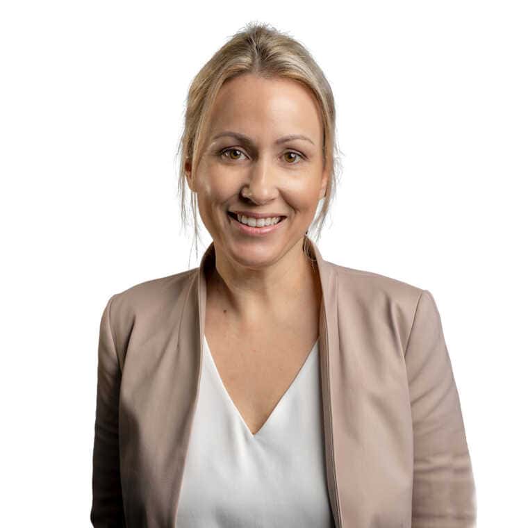 Professional woman smiling in business attire for CMEWA event.