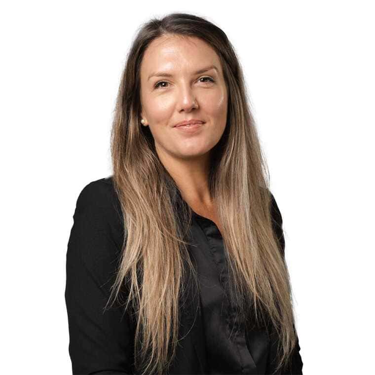 Professional woman in business attire, headshot with a confident expression for CMEWA website recognition.