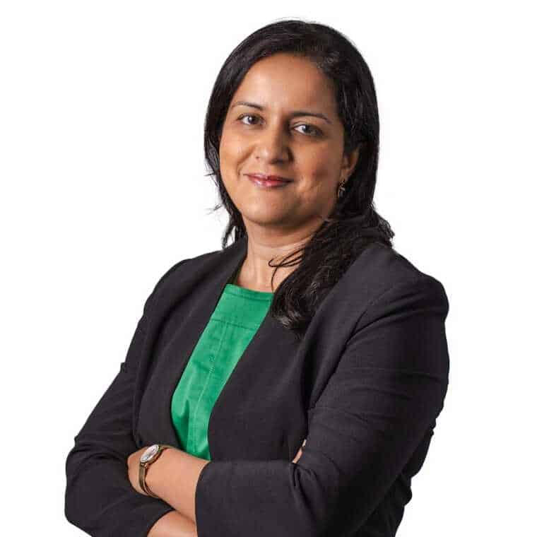 Experienced professional woman in business attire for CMEWA imagery, showcasing leadership and confidence.
